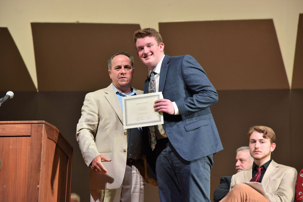 Jagoda scholarship award recipient Teddy Holly with Chairman of Humanities Joseph Leavy. 