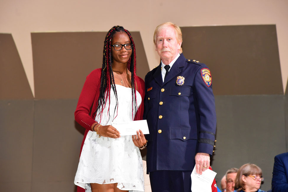 Ashanna Archibald with Kevin McPadden of the Nassau County Police Running Club