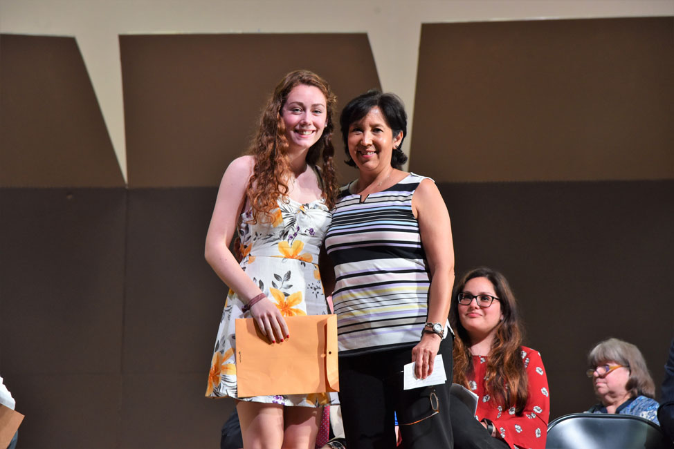 Linda Shoemaker Blue Devil Band Scholarship recipient Meagan Malone with Band Parents Assn. co-President Miriam Engle.