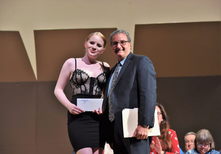 Jeraine Nieves-Morales with Huntington Lions Club President John DeLorenzo.