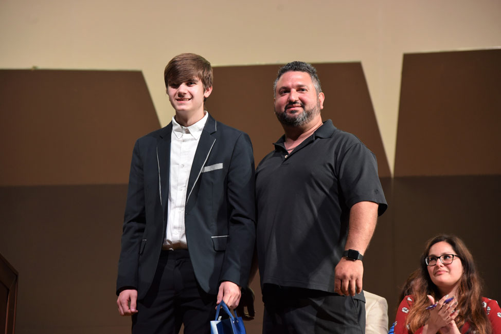 Franco Aloe (right) presented the AloeTech Inc. scholarship to Huntington senior James Crugnale.