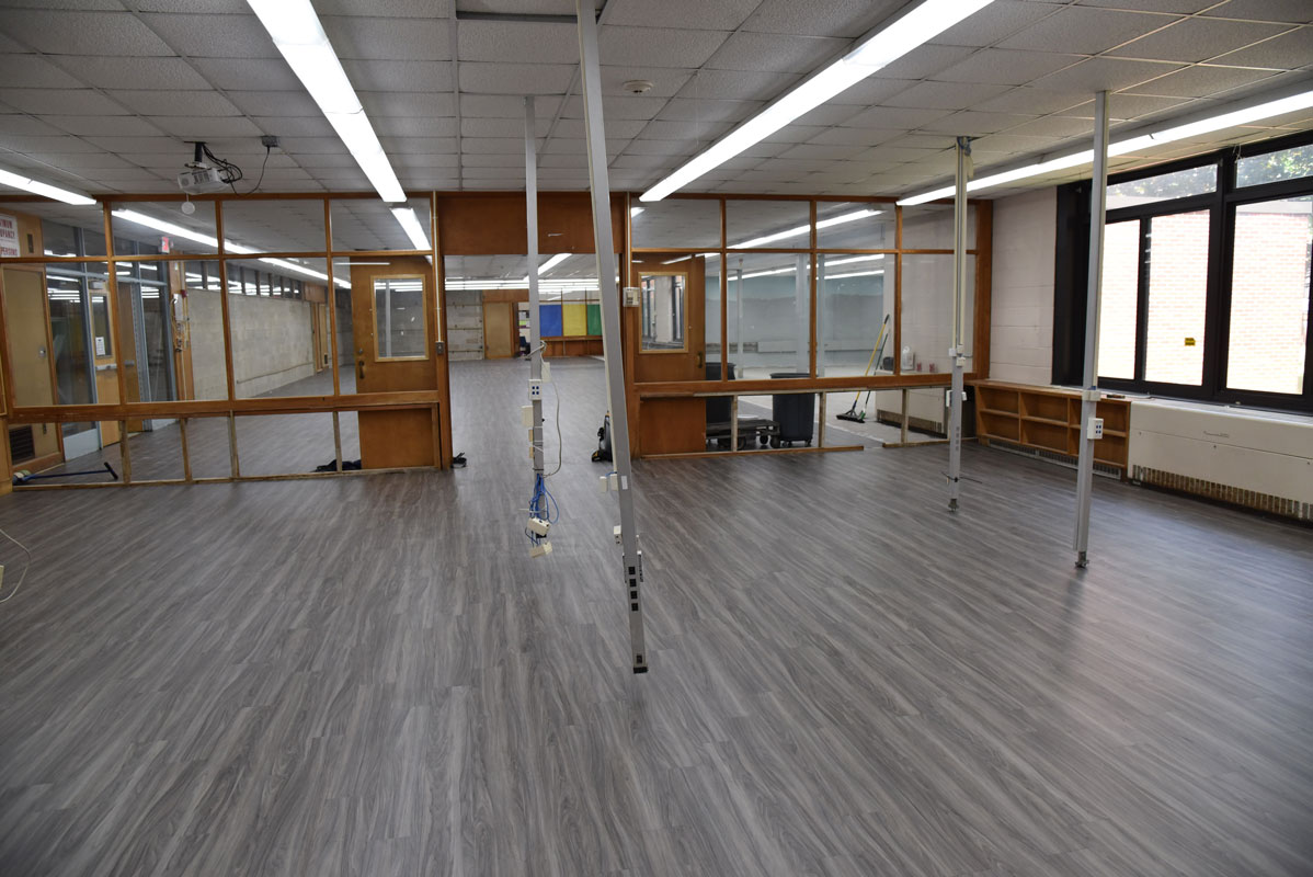 The original Huntington High School library flooring is being replaced with vinyl planks 