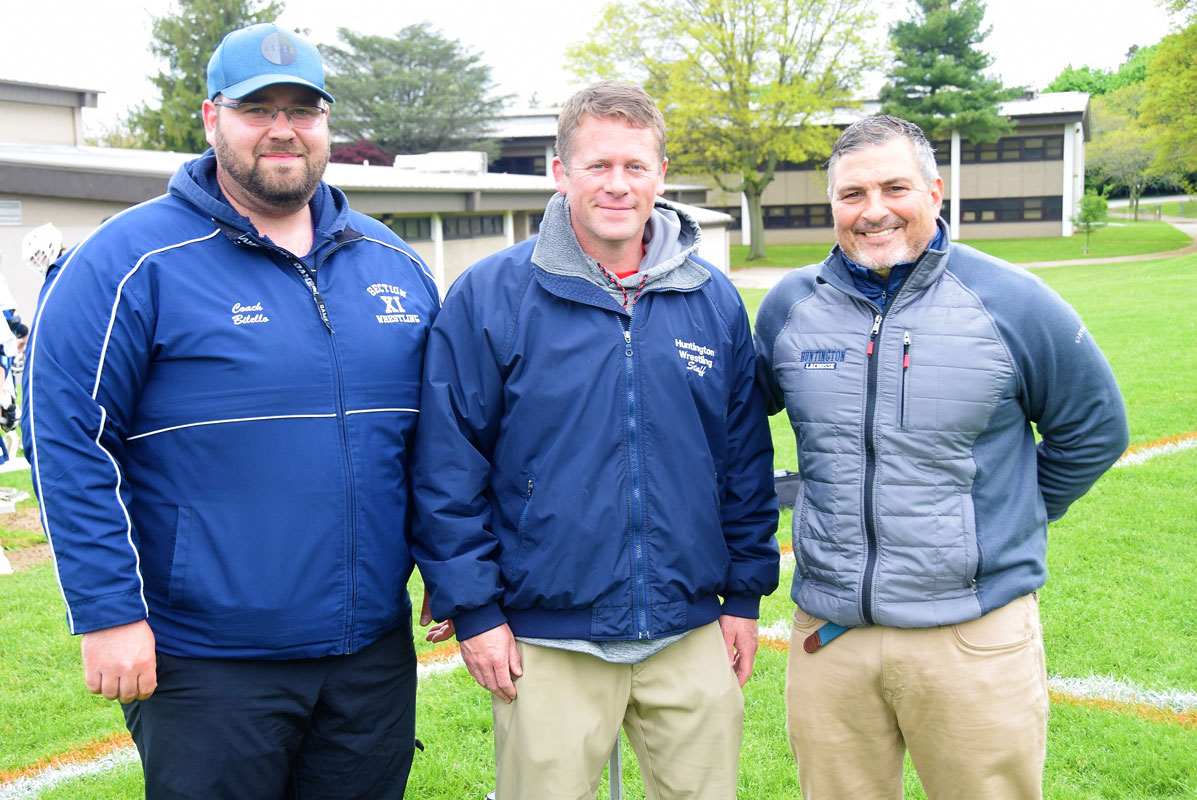 Finley head coach Travis Smith is flanked by assistant coaches Matt Bilello and Anthony Annunziata 