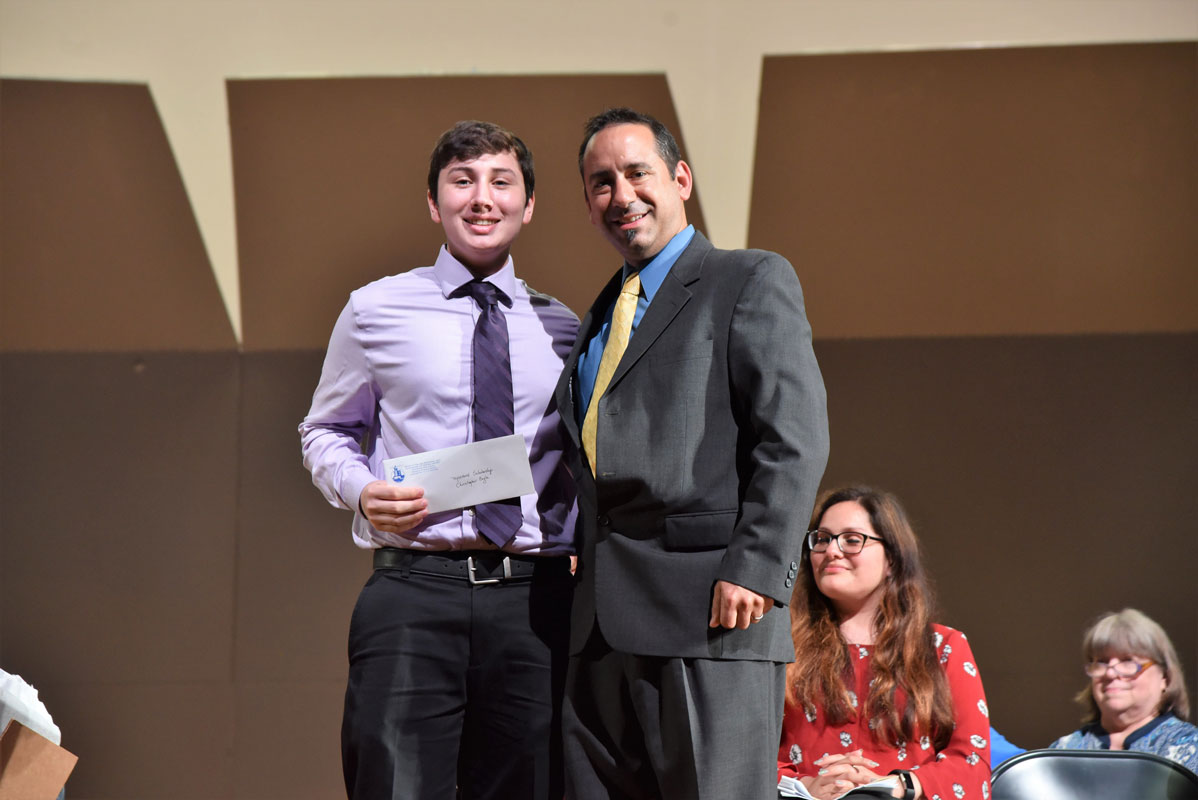 New York State Council of Administrators for Music Education scholarship winner Chris Engle with teacher Jason Giachetti.