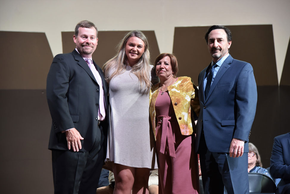 Justin Giani Scholarship recipient Christie Baade (second from left) with James Graber and Linda and Joseph Giani