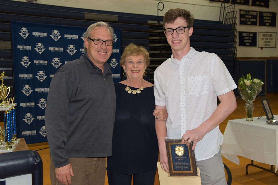 Fred and Betsy Cambria with Jackson Pitti at the Blue Devil senior athletic awards banquet.  