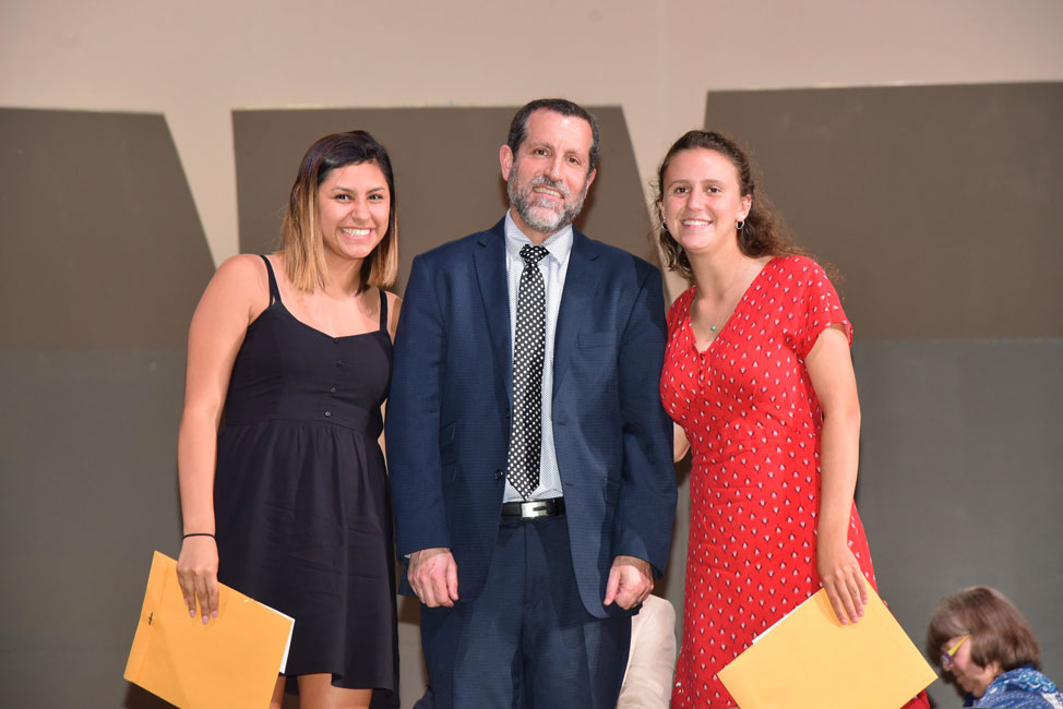 Superintendent Jim Polansky with National School Development Council award recipients Kiara Rafailan and Alyssa Sorensen.