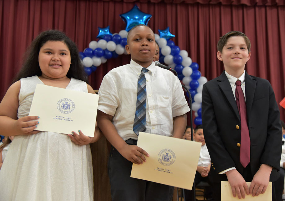 New York Attorney General Triple C Award recipients Valerie Alfaro, Samuel Osias and Fintan Hackett-Johnson 