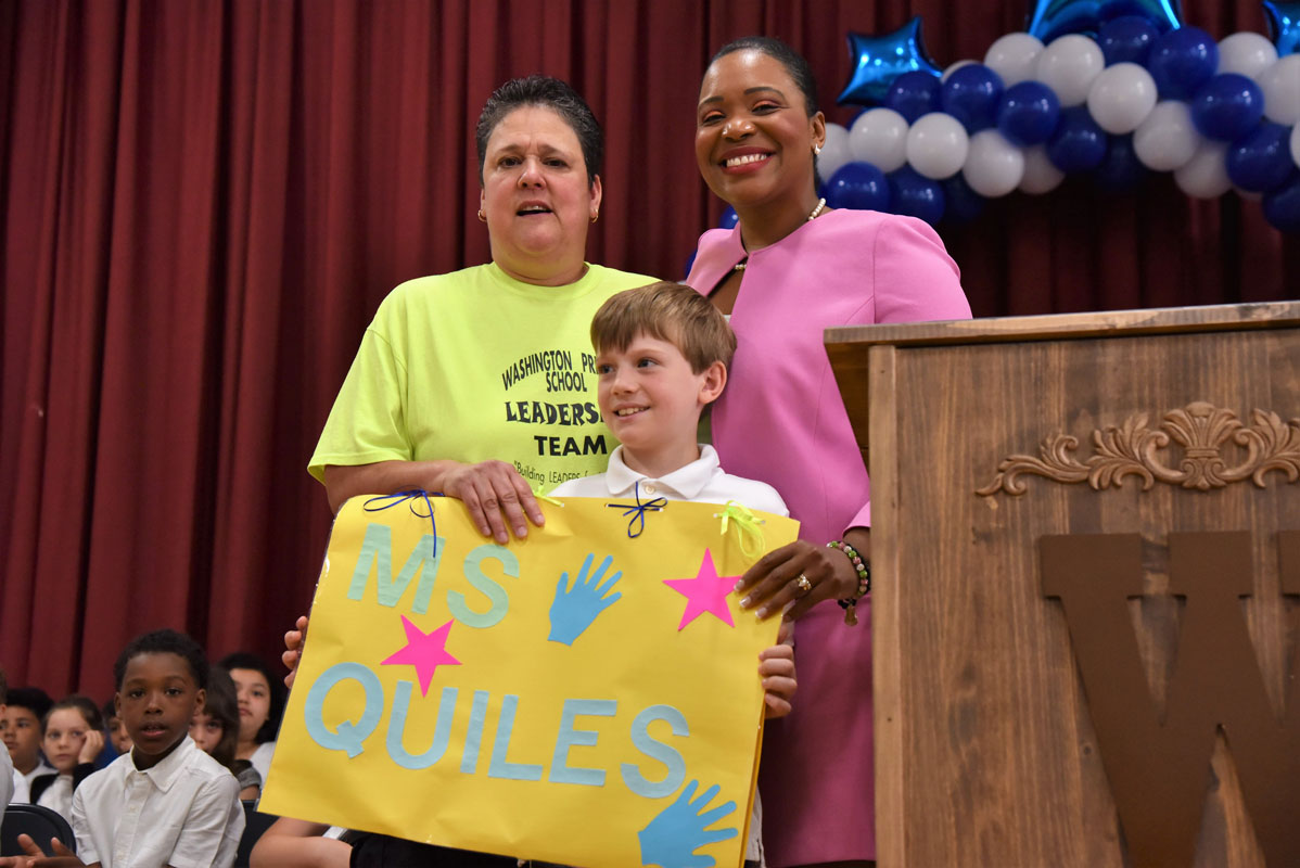 Retiring Washington School teacher Debbie Quiles was recognized during the moving up exercises.