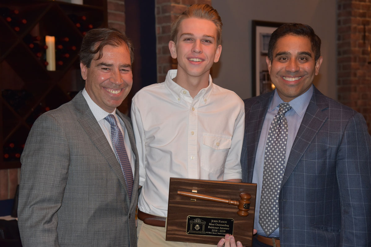 Most Outstanding Petitioner's Attorney Award recipient John Panos with John LoTurco and Xavier Palacios.