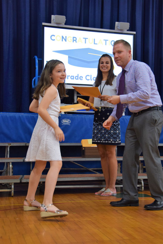 Principal Scott Oshrin presented a certificate to each of the Southdown third graders