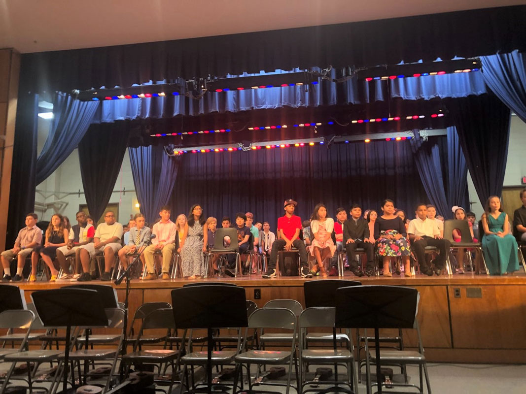 Jack Abrams STEM Magnet School's Class of 2019 on the stage in Adam Spector Auditorium.