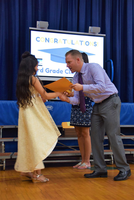 Principal Scott Oshrin presented a certificate to each of the Southdown third graders