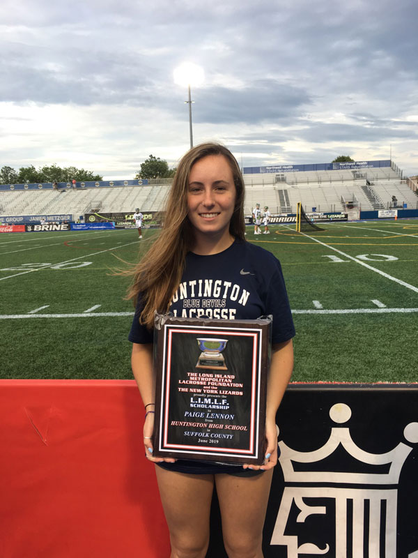 The LI Metropolitan Lacrosse Foundation and the New York Lizards presented Huntington senior Paige Lennon with a scholarship award.