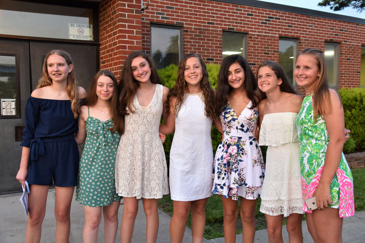Classmates gathered for an endless series of photos following Finley's moving up exercises