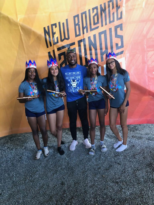 Huntington coach Mark Jackson with All-Americans Dejanae Linton, Olivia Conte, Alicia Brooks and Analisse Batista 