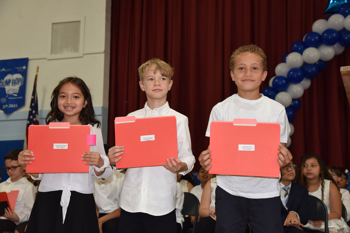 Washington Physical Education Award recipients Janelle Benitez Euceda, Charlie Cirlincione and Kingsley Evans 