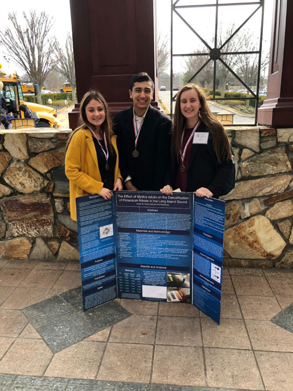 Ava Waxenberg, Zubair Ali and Peyton Kalb took third place at the LISEF.