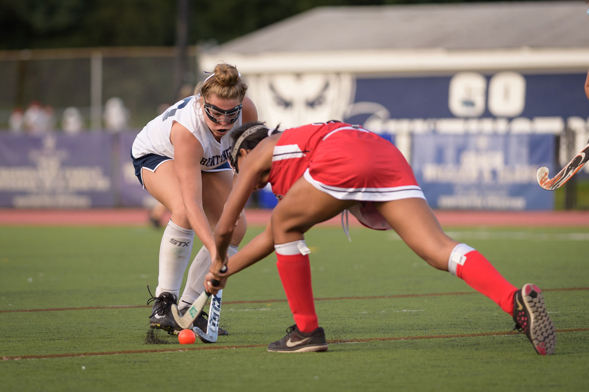 Maya Santa-Maria (left) can always be found where the action is on the field. (Darin Reed photo.)