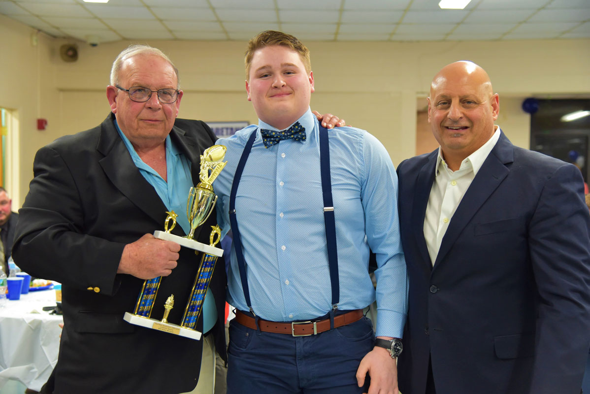 Pete Sansiviero Offensive Lineman Award winner Aidan Mrotzek with Pete Sansiviero and Steve Muller 