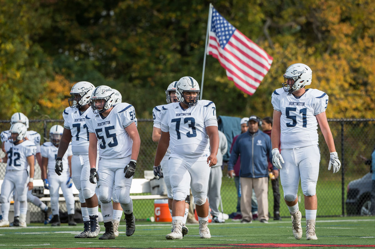 Aidan Mrotzek (No. 55) heads to the line of scrimmage with his teammates. (Darin Reed photo.)