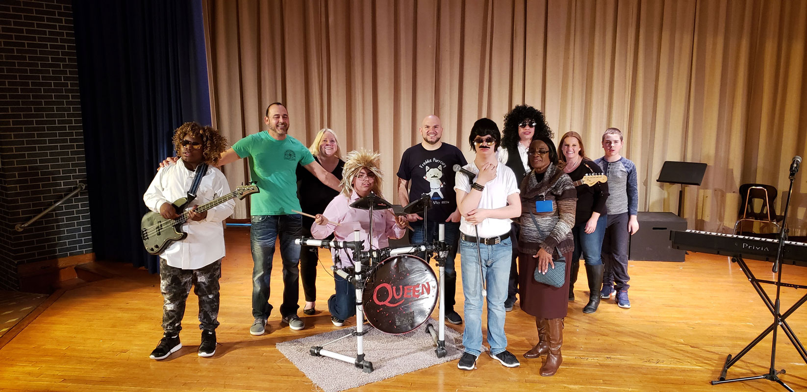 The Finley students with the teachers and teacher aides who helped make their talent show performance possible.