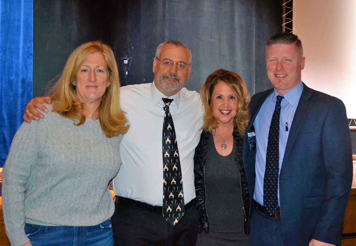PTSA President Laura Cheshire with Dean Paul Caleca, Karen Torres and Principal Brenden Cusack.