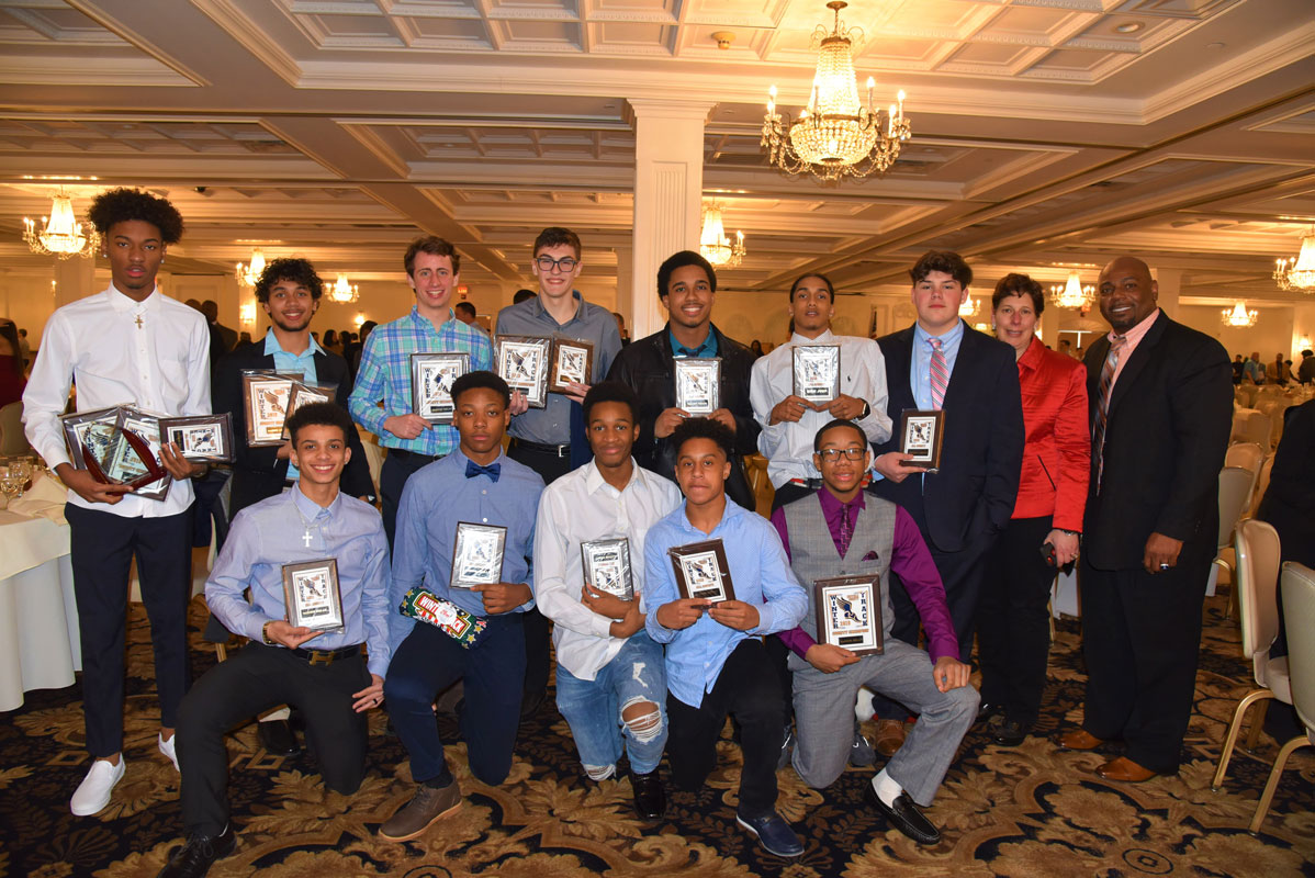 The Blue Devil boys' track coaches and honorees at the Suffolk All-County dinner at Villa Lombardi's.