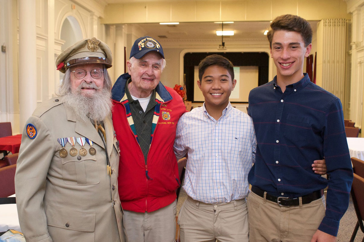 Two honored veterans with Paul Katigbak and Julien Rentsch at the Northport VA Medical Center