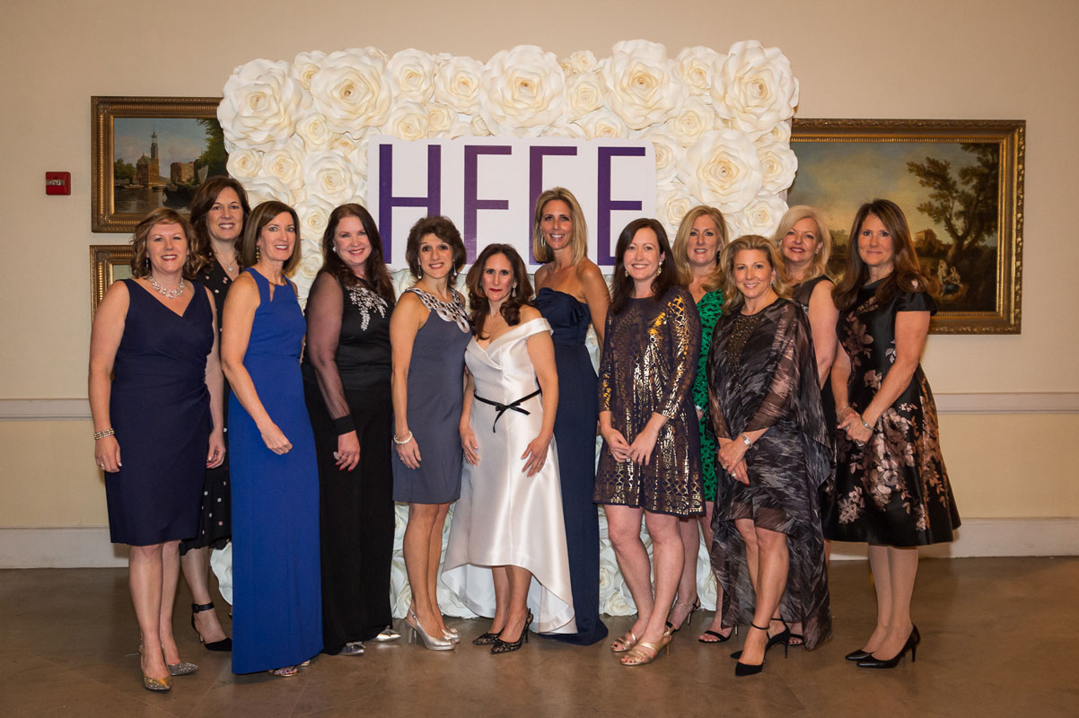 HFEE President Alice Marie Rorke (center) is flanked by board members and volunteers. (Darin Reed photo.)