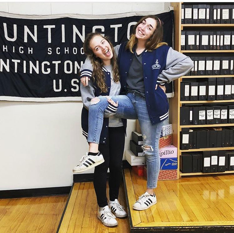 Mia Nitekman (left) and Isabella Cahill goof around in the chorus room at Huntington High School.
