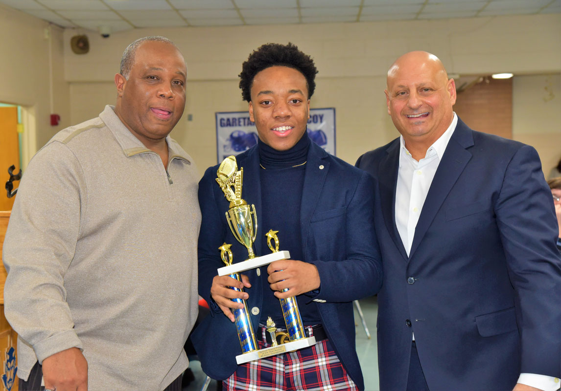 Special Teams Player of the Year Award winner Nasir Youngblood with coaches Todd Jamison and Steve Muller