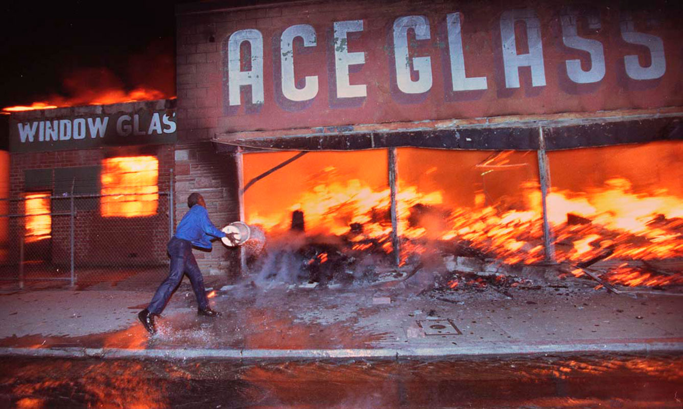 Riots spread across Los Angeles following the police beating of Rodney King in 1992.
