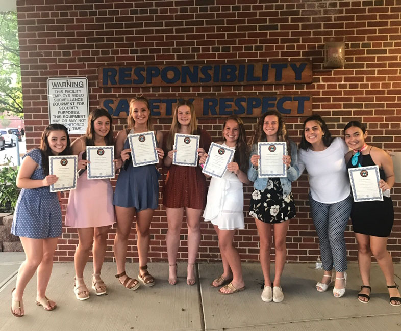 Huntington High School's World Language Honor Societies inducted dozens of new members last week.