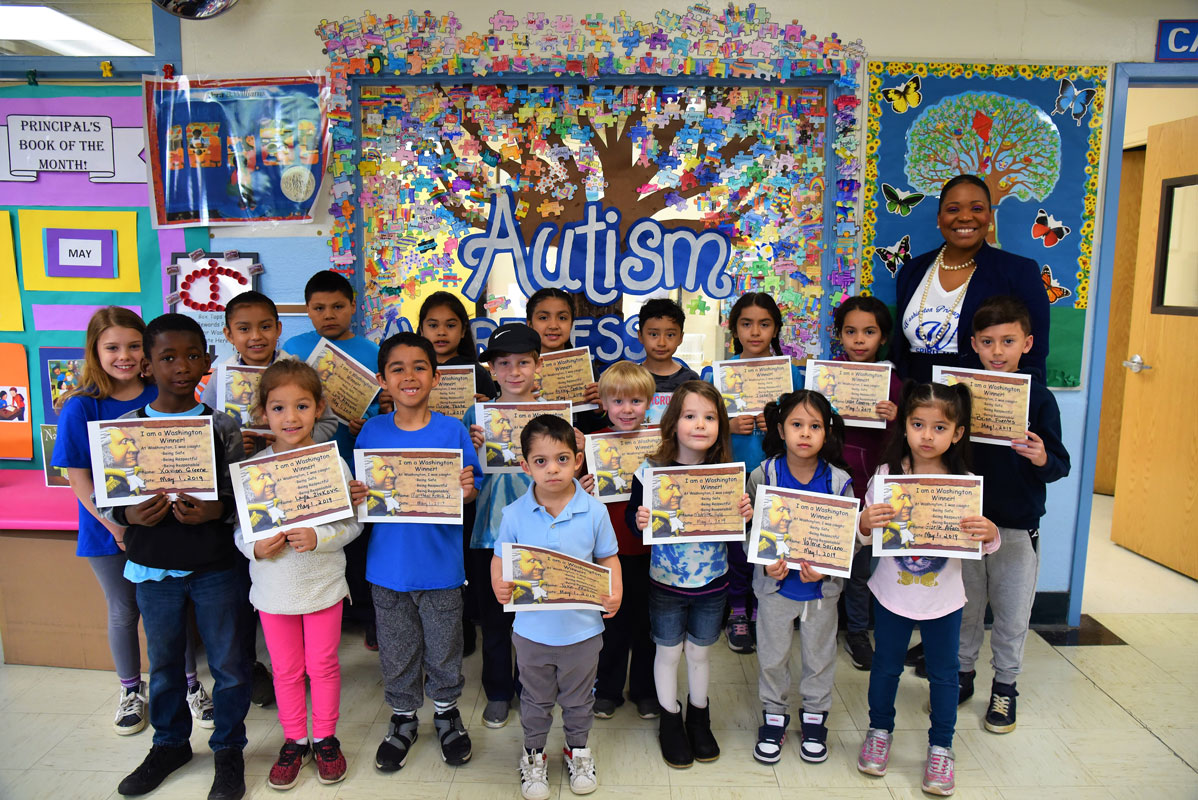 Principal Michelle Richards with April's Washington Ways Award recipients