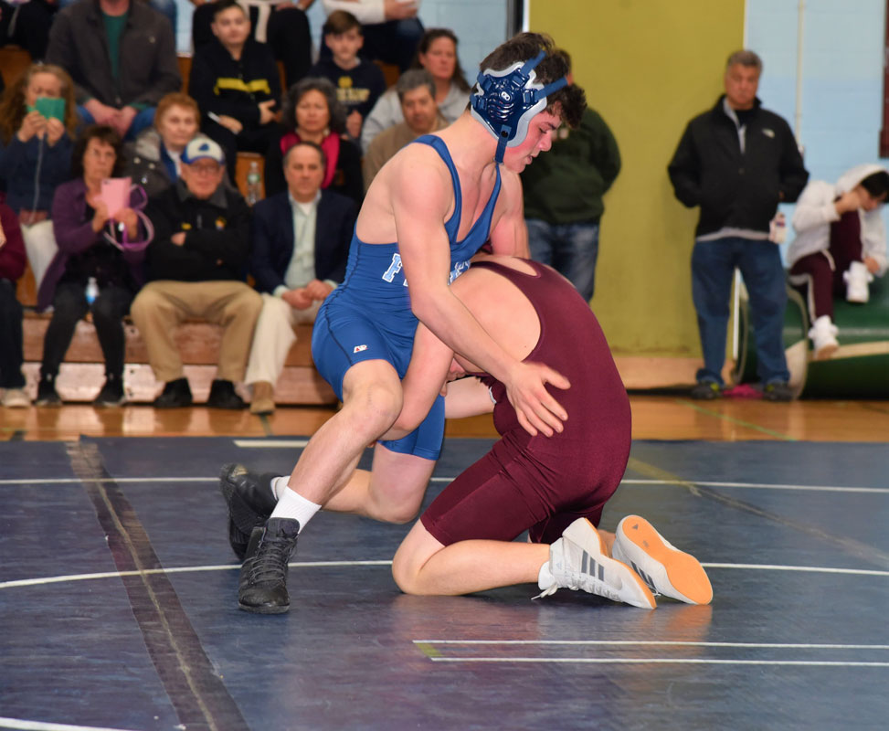 Teddy Leavy (in blue) looks to gain an advantage