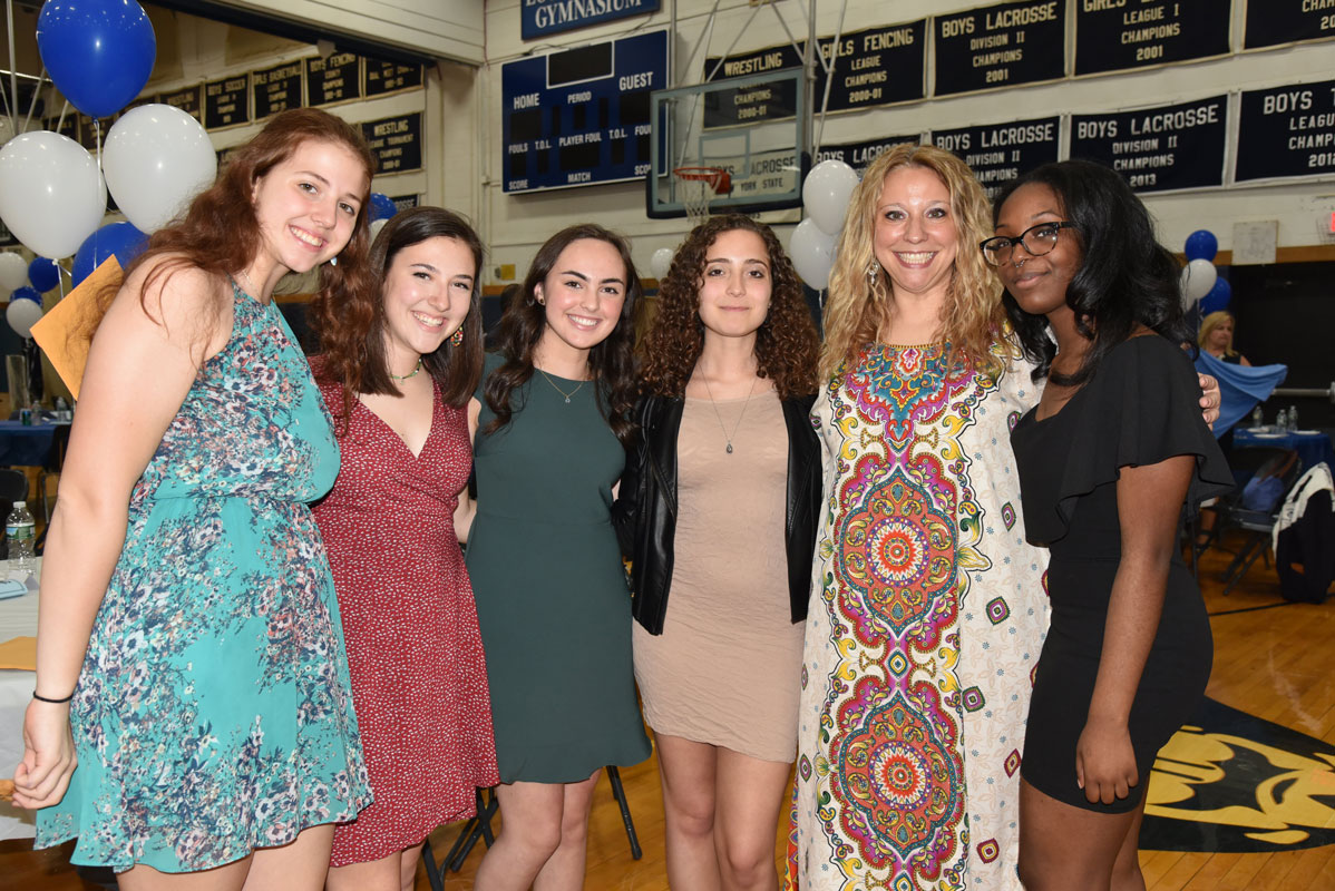Honored teacher Camille Tedeschi (second from right) with a group of Distinguished Seniors 