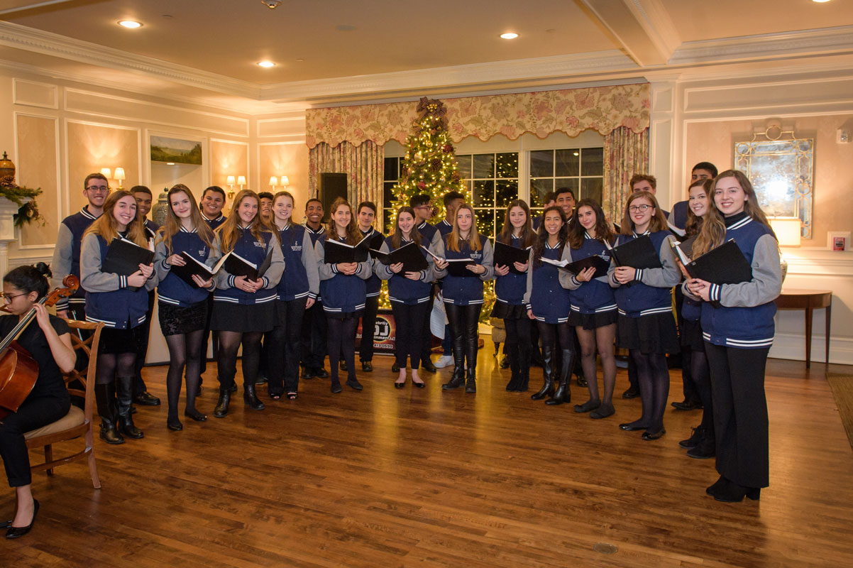 The Huntington chamber choir performing last winter at the Huntington Country Club.