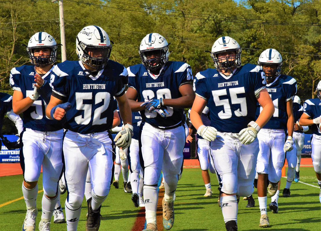 The Huntington varsity football team will play Copiague on Homecoming Day next fall.