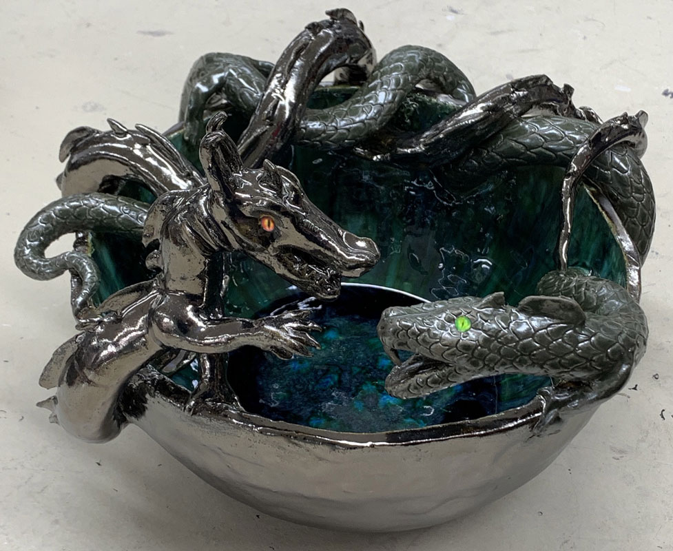 Andrew McKenzie  award winning sculpture titled Society was inspired by Arthur Quartley's Sea Serpent.