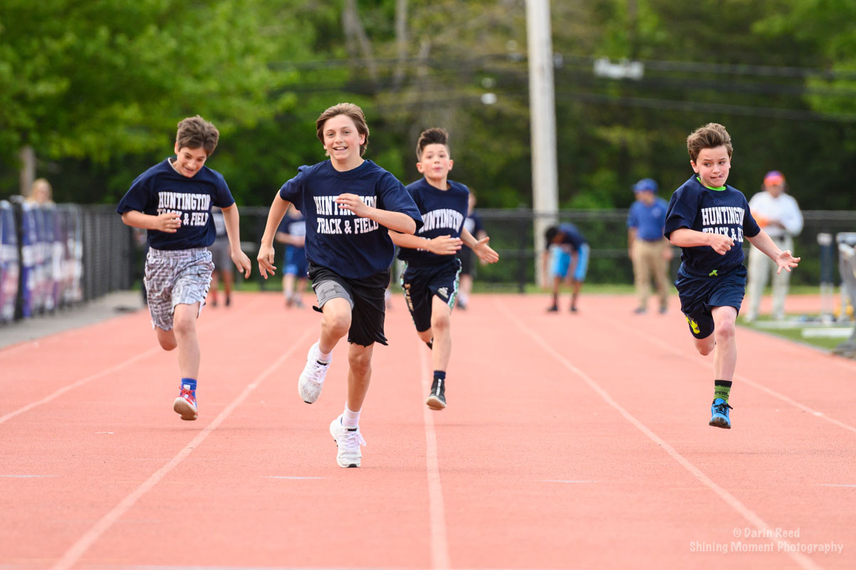 The 100m dash was fiercely contested by the Huntington sixth graders. (Darin Reed photo)