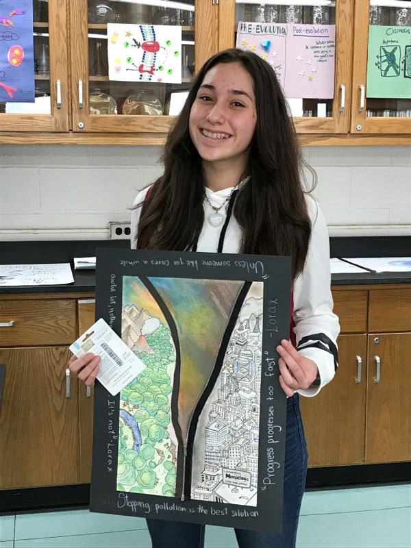 Naysa Escobar-Rizo with her first place poster.