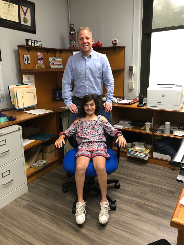 Southdown Principal Scott Oshrin with Principal for a Day Brooke Murphy.