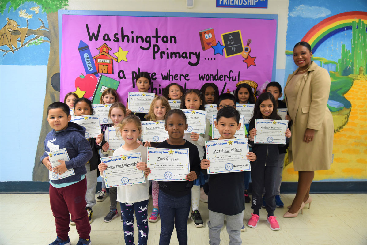 Principal Michelle Richards with October's Washington Ways Award recipients 