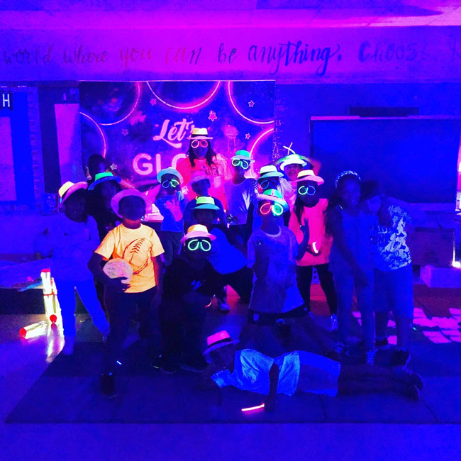A group of Flower Hill School students enjoyed a glow in the dark room transformation
