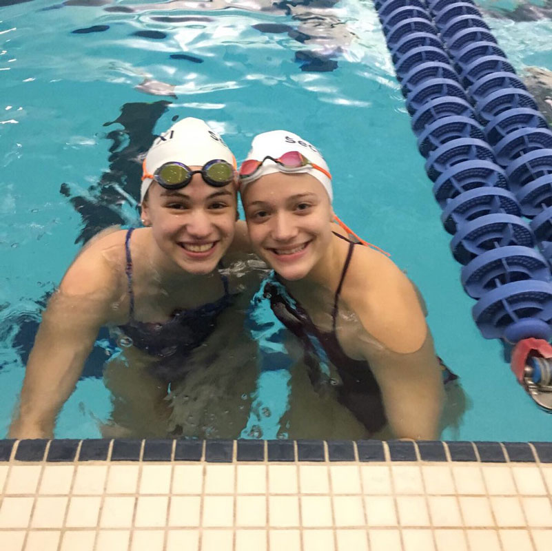 Huntington freshman Kathryn Montefusco (left) is all smiles in the water.