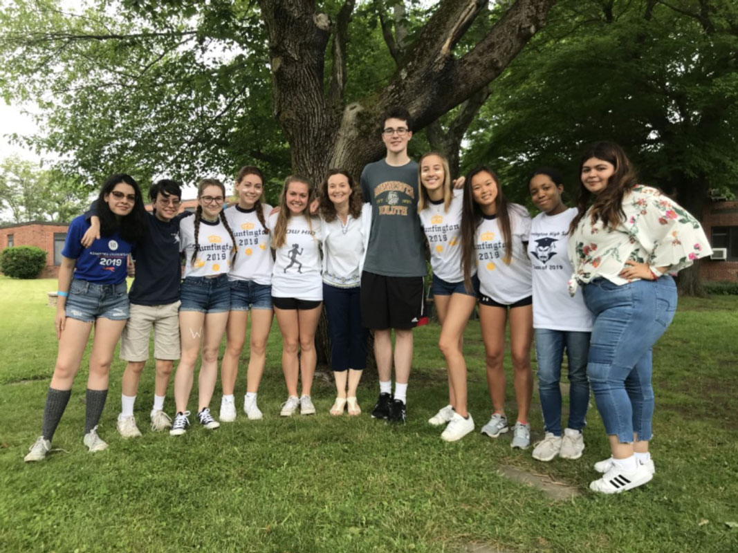 New York State Seal of Biliteracy Award recipients are shown with teacher Deidre Meyer.