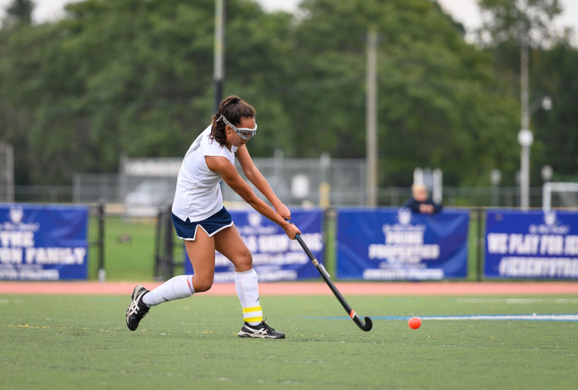 Anna Wickey blasts the ball for Huntington. (Darin Reed photo.)