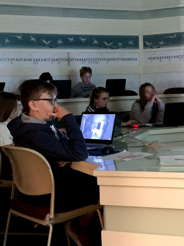 Huntington SEARCH program sixth graders conducted labs at the DNA Learning Center .