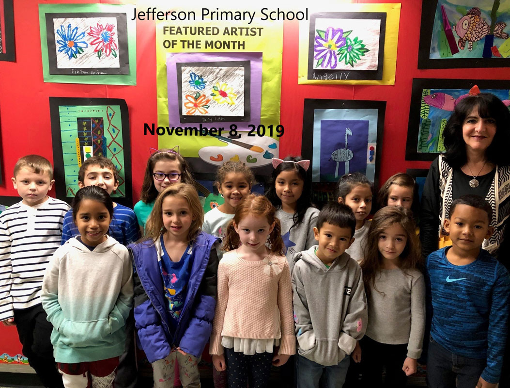 Art teacher Maria Mazzola with Jefferson School's Featured Artists of the Month.
